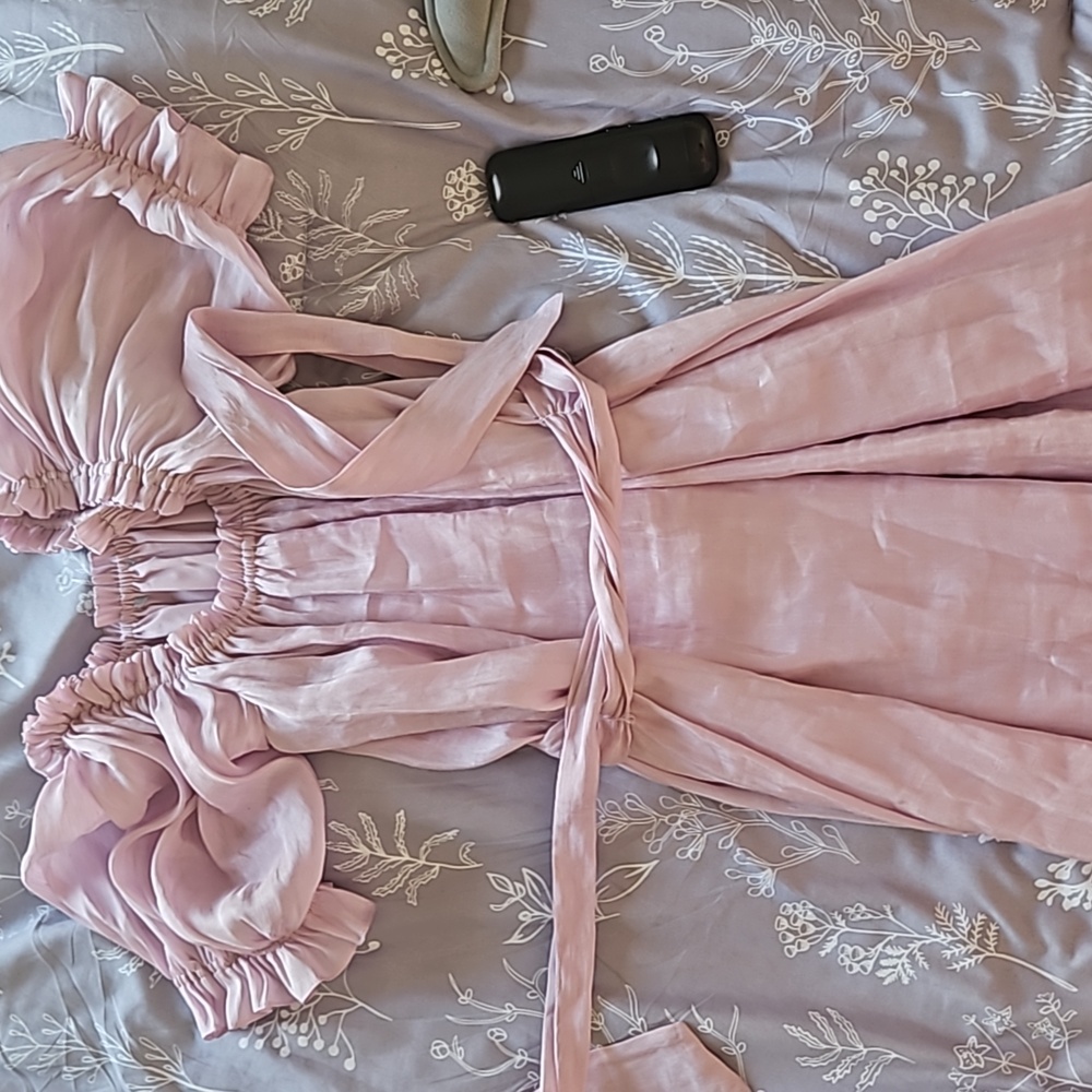 a purple ruffle sleeve dress